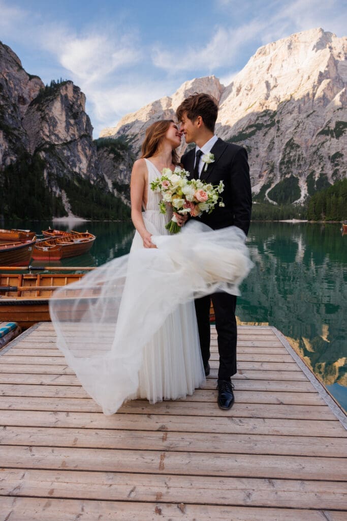 Couple who chose to elope instead of a big wedding, getting ready at Camp Sass, Italy